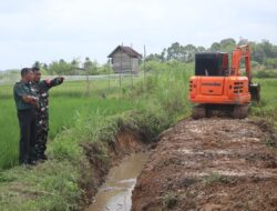 Dukung Ketahanan Pangan Nasional Kodim 0416/Bute Bangun Sodetan Saluran Air